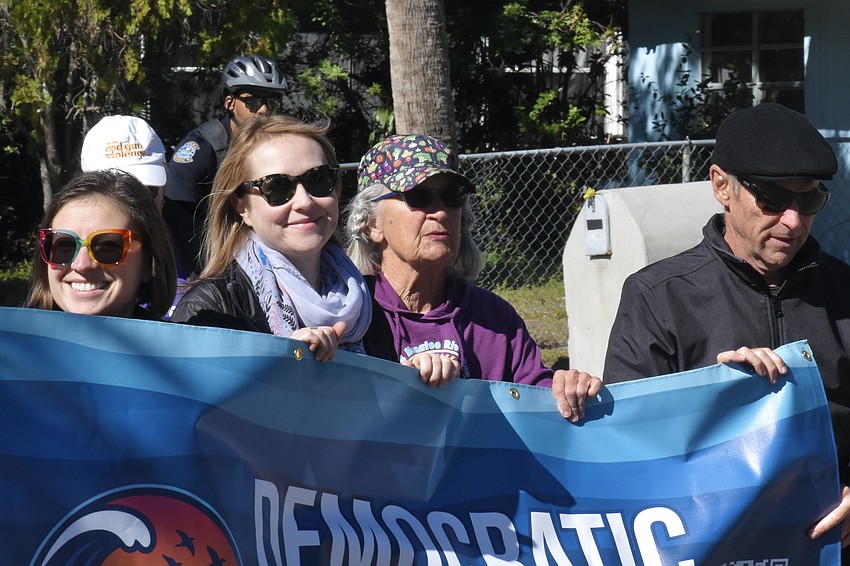 Amanda Just, Melissa Bartalos, Pamela Wusthof and Chris Kilmer of the Democratic Womens Club of Sarasota walk in the parade.