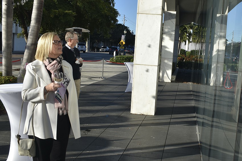 Melissa and Scott Dunlap view the display.