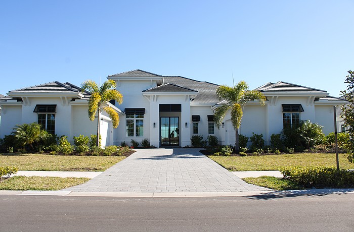This Wild Blue at Waterside home at 560 Blue Shell Loop sold for $3.41 million. Built in 2025, it has four bedrooms, four-and-two-half baths,
a pool and 4,452 square feet of living area.