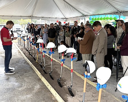 One Stop Housing CEO and Managing Partner Mark Vengroff speaks with supporters at the groundbreaking of Sarasota Station.