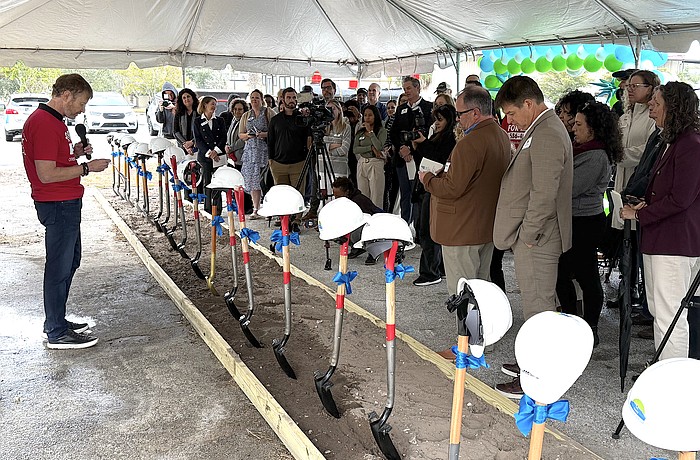 One Stop Housing CEO and Managing Partner Mark Vengroff speaks with supporters at the groundbreaking of Sarasota Station.