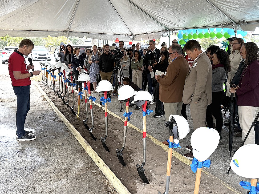 One Stop Housing CEO and Managing Partner Mark Vengroff speaks with supporters at the groundbreaking of Sarasota Station.