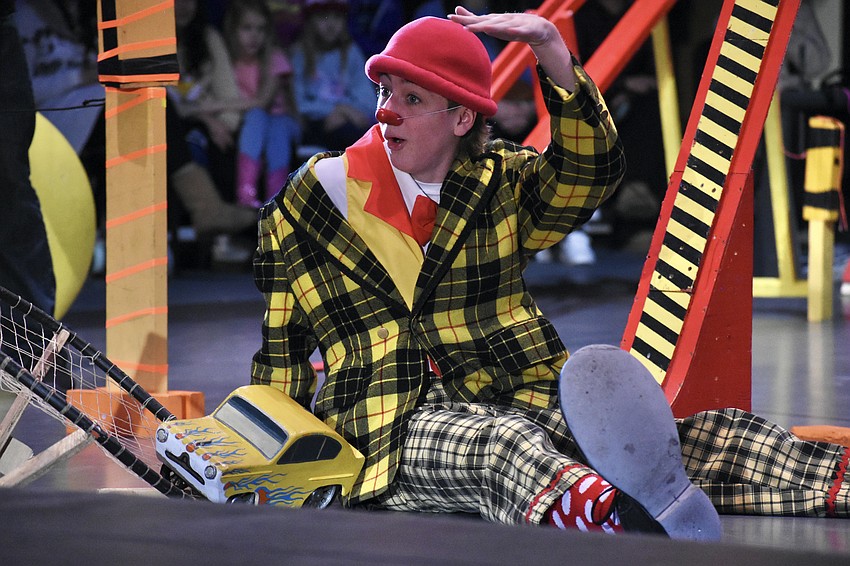 After being set free on a track and ramp, a miniature car soared over Kepler Henry and landed in a net, demonstrating kinetic and potential energy.