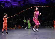 Alaina Loyal and Gia Sammelman demonstrate concepts including push, pull, kinetic energy, friction.