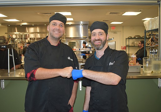 Brent Jephson and Chef Instructor Benjamin Burnside celebrate a job well done.