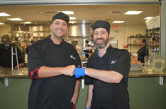 Brent Jephson and Chef Instructor Benjamin Burnside celebrate a job well done.