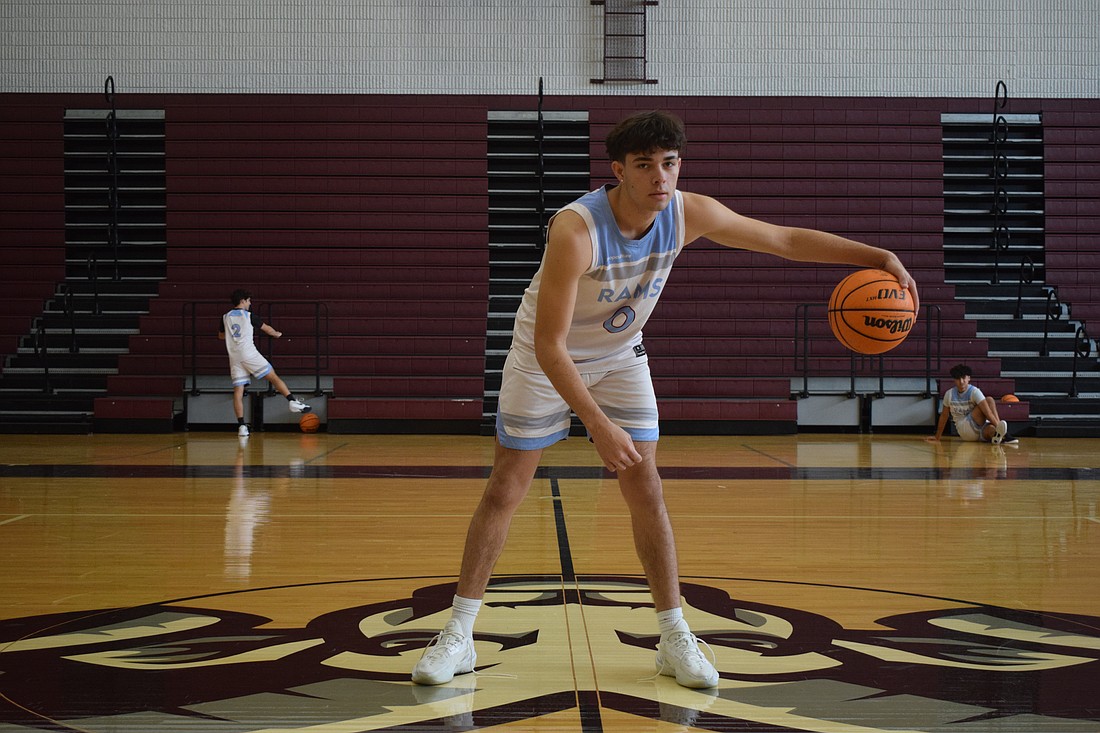 Josh Harris shows off his handle before practice at Riverview High School. The senior guard leads all of FHSAA Class 7A in scoring, as of Jan. 18, with 24.2 points per game.
