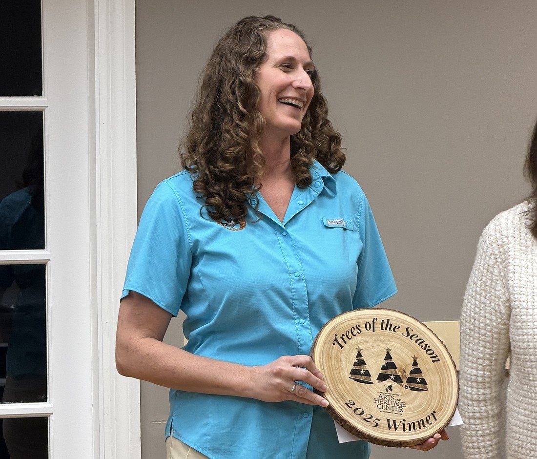 Oakland Nature Preserve Managing Director Nicole O’Brien accepted an award for the preserve winning the Trees of the Season decorating contest.