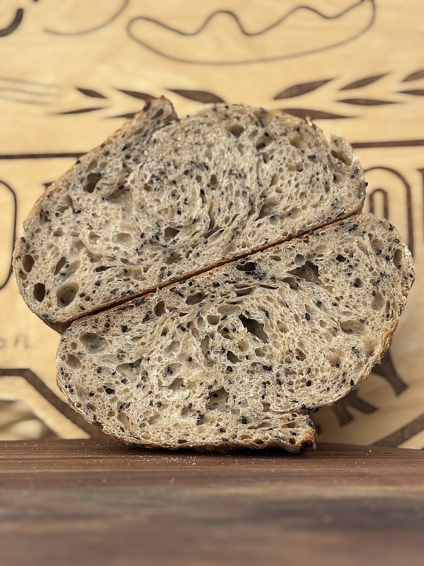 This is a seeded version of Crust N' Crumb's sourdough bread.