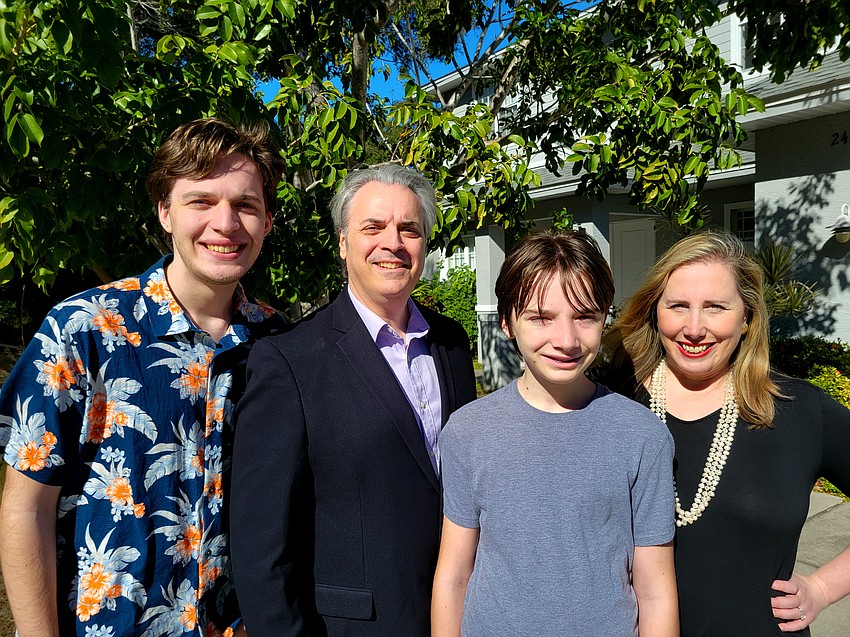 Marie Selby Botanical Gardens President and CEO Jennifer Rominiecki with (from left) son, Luke; husband, Rob; and son, Noah.