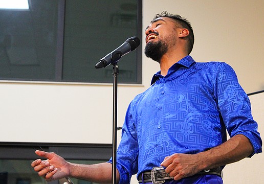 Westcoast Black Theatre Troupe singer Michael Mejia-Mendez belts the opening note of Harry Belafonte's iconic "Day-O" during a tribute performance on Jan. 21 at Christ Church of Longboat Key.