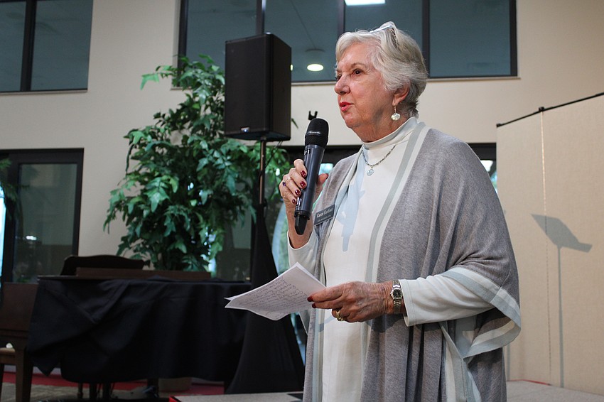 Karen Gardiner, one of the evening's main coordinators, introduces the Westcoast Black Theatre Troupe's Michael Mejia-Mendez to perform a tribute to Harry Belafonte on Jan. 21 at Christ Church of Longboat Key.