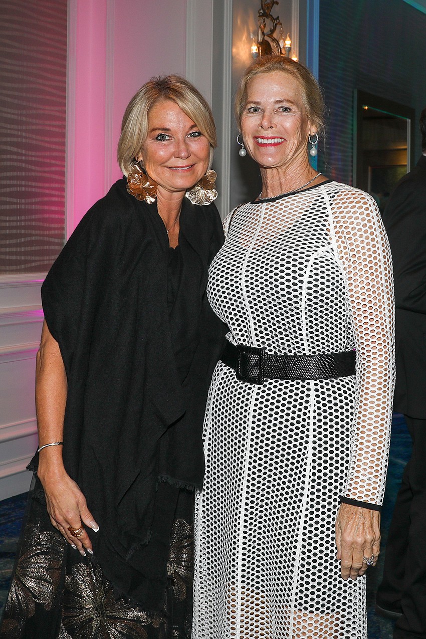 Alyssa Fiumano and Eileen George enjoy the orchestra's cocktail reception.