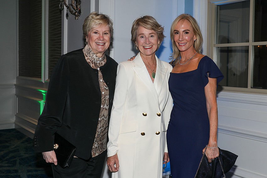 Always fetching are Marjorie Floyd, Caroline Amory and Lisa Morris.