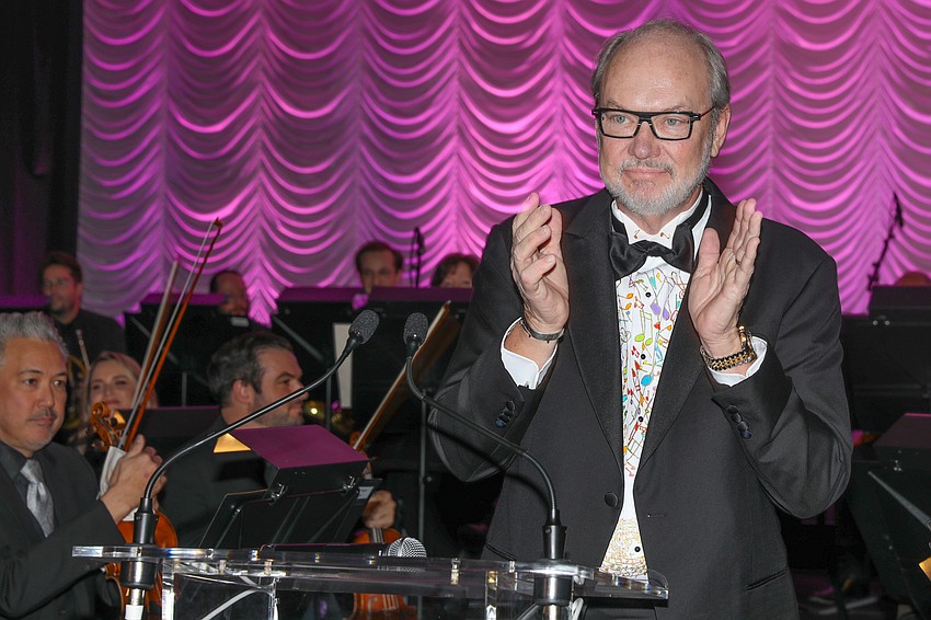 Board Chair Tom Koski delivers his welcome address to 400 guests.