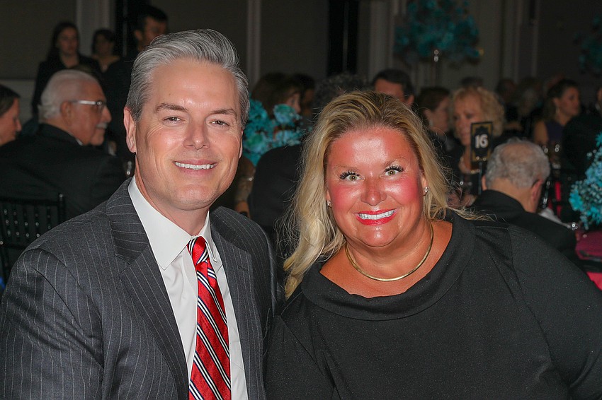 Title sponsor from the Gulf Coast Community Foundation Phillip Lanham and his wife, Tami.