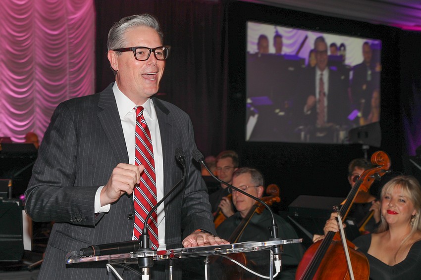 Phillip Lanham from the Gulf Coast Community Foundation gives a welcome address.