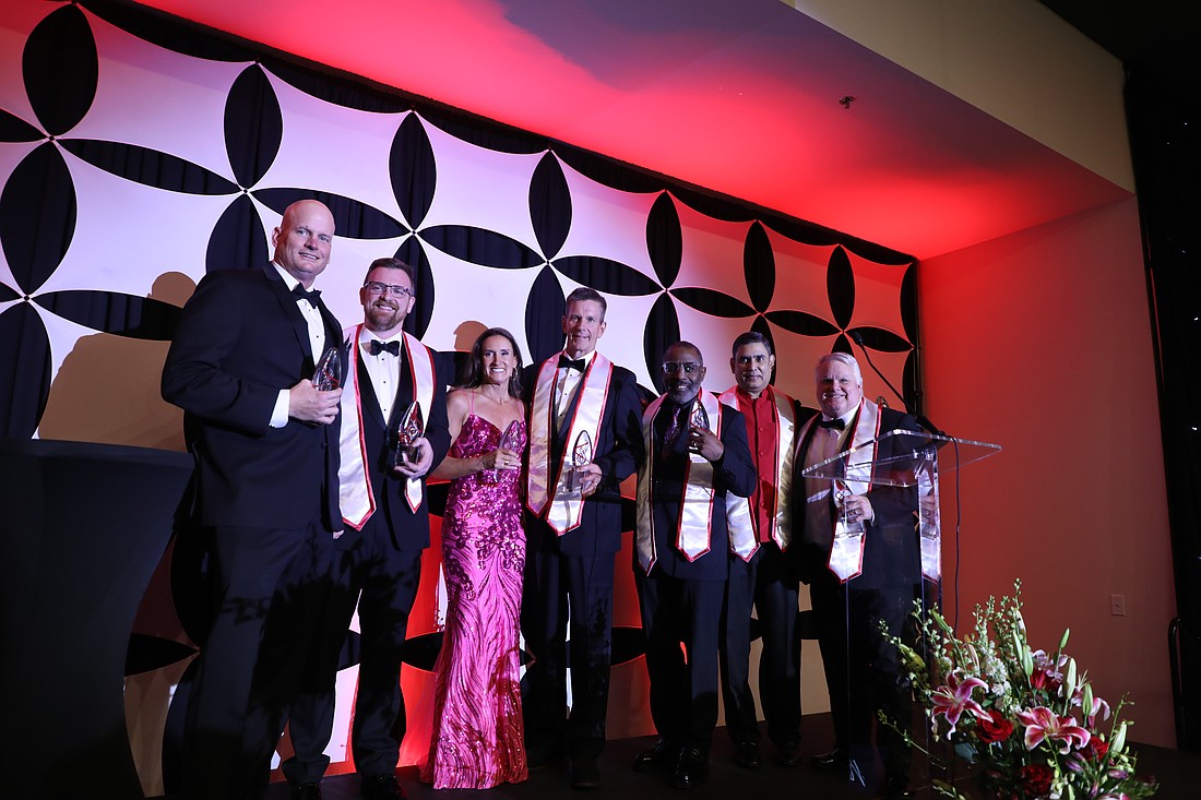 Winners of the inaugural PS27 Entrepreneur Awards, from left: Kelly Dyer, Andrew Rush, Summer Vyne, Jim Evanger, Anthony B. Miles, Raghu Misra and Ted Willich.