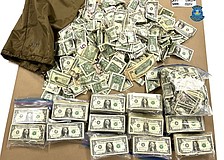 About $12,000 in small bills was seized as part of the investigation.