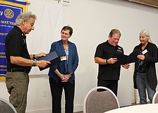Rotarians Gene Luca, left, and President Terri Driver, right, thank Goodwill Manasota Veterans Services' Margie Genter and Randy Wright for offering insights into how it benefits community members. Representatives joined the Rotary Club of Longboat Key on Jan. 20 at All Angels by the Sea Episcopal Church.