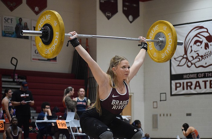 Senior Taylor Ford competes at the FHSAA Class 2A-District 12 Championship Jan. 24 at Braden River High School. She won silver in Olympic style for the 139-pound weight class as the Pirates claimed their fourth straight district title.