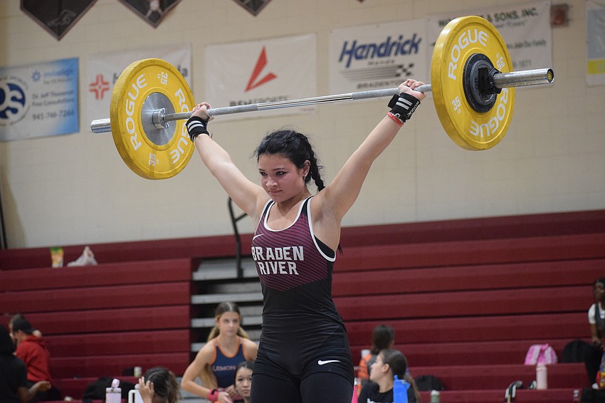 Sophomore Ellen Lehman finished second in olympic style for the 129-pound weight class at districts. Last season, she became the first freshman in program history to medal at the state championships.