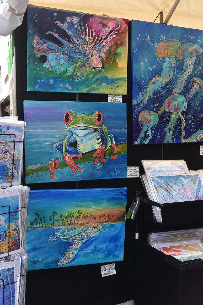 Jen Callahan, who lives in Costa Rica, has been in Florida for a month to participate in four different art shows, including the Lakewood Ranch Fine Art Festival. She uses water based paint to create pieces inspired by the ocean which include jellyfish, manatees and mermaids.