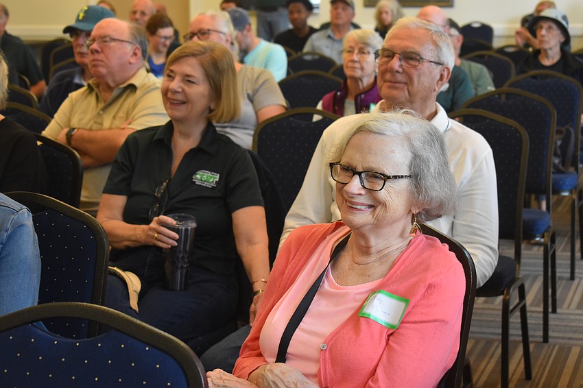 Judy Miller listens to Jared Leggett, chief of Manatee County Search & Rescue, speak at the free community event sponsored by the Lakewood Ranch Community Emergency Response Team.