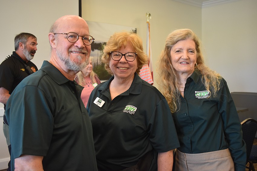 Lakewood Ranch Community Emergency Response Team members Phil Westerman, Gloria Schroek and Paulette Westerman were eager to host the search and rescue dogs for their event.