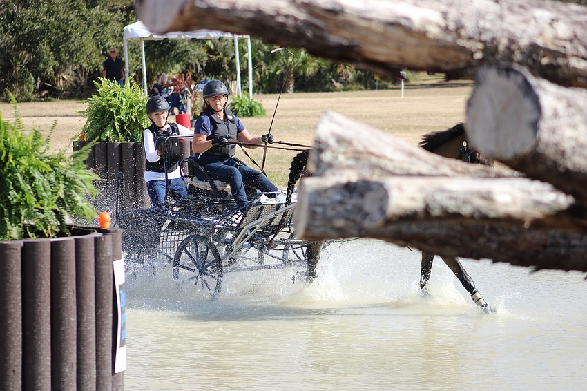 Driver Sara Schmitt eases into an obstacle.