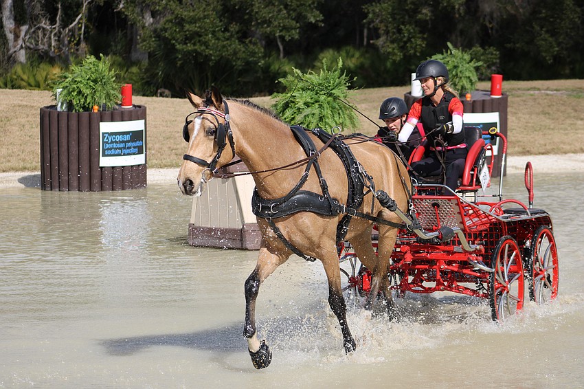 Driver Linda Poulin might not have been the fastest through the obstacles, but she certainly was driving one of the prettiest carts.