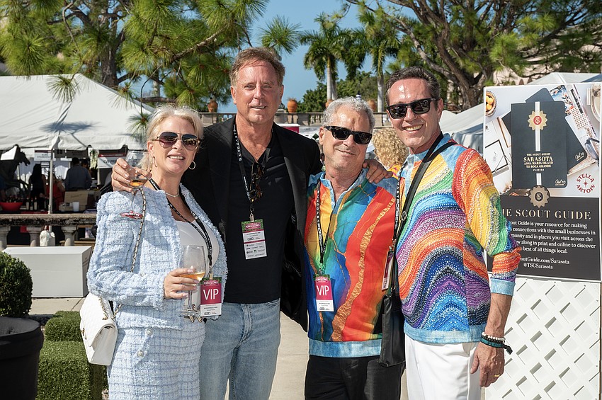 Jill and Chip Valente with Jim Helmich and Scott Franza