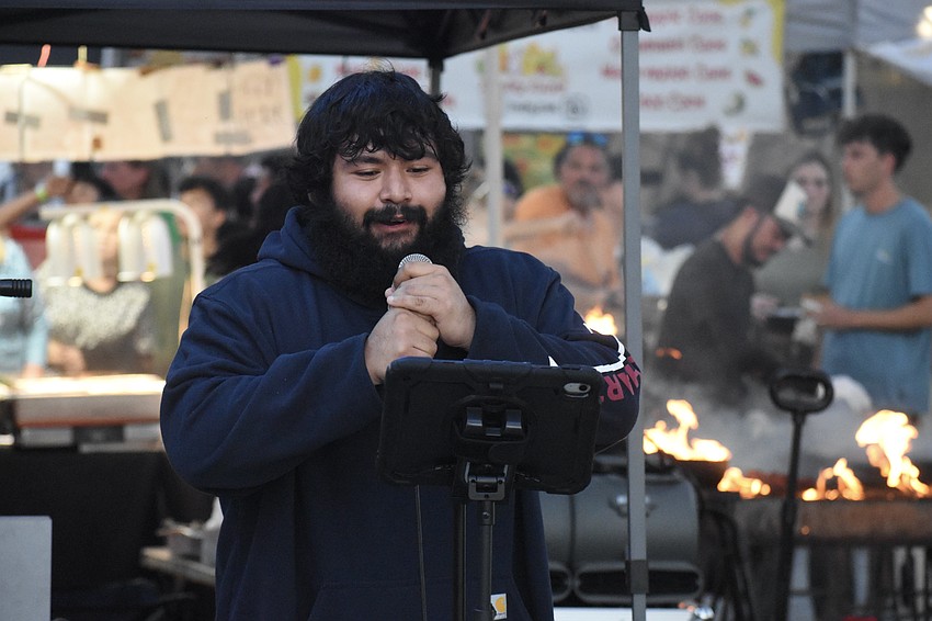 Carlos Calixtro goes for a round of karaoke.