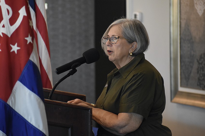 Immediate Past Commander Barbara Warshaw delivers an outgoing speech.