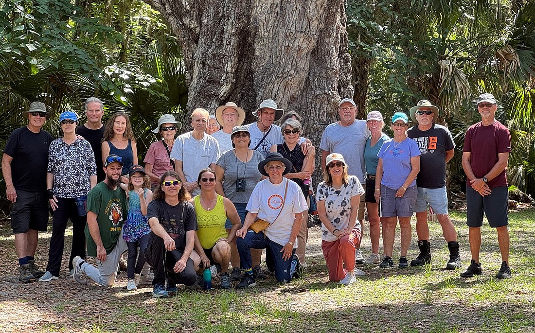 ReGrow the Loop participants gather under the Fairchild Oak at Bulow State Park during a 2025 tree ID walk, led by Laura Ureta, with the City of Ormond Beach (front row, fourth from left). Courtesy photo