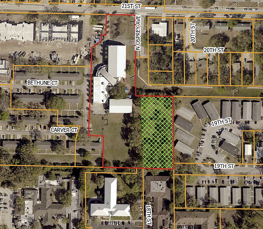 The McBean Boys and Girls Club site is outlined in red. The area highlighted in green is rezoned property that will become part of its new facilities.