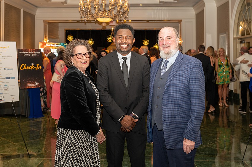 Debra Flyntt-Garret, Co-chair Etienne Porter  and Michael Page