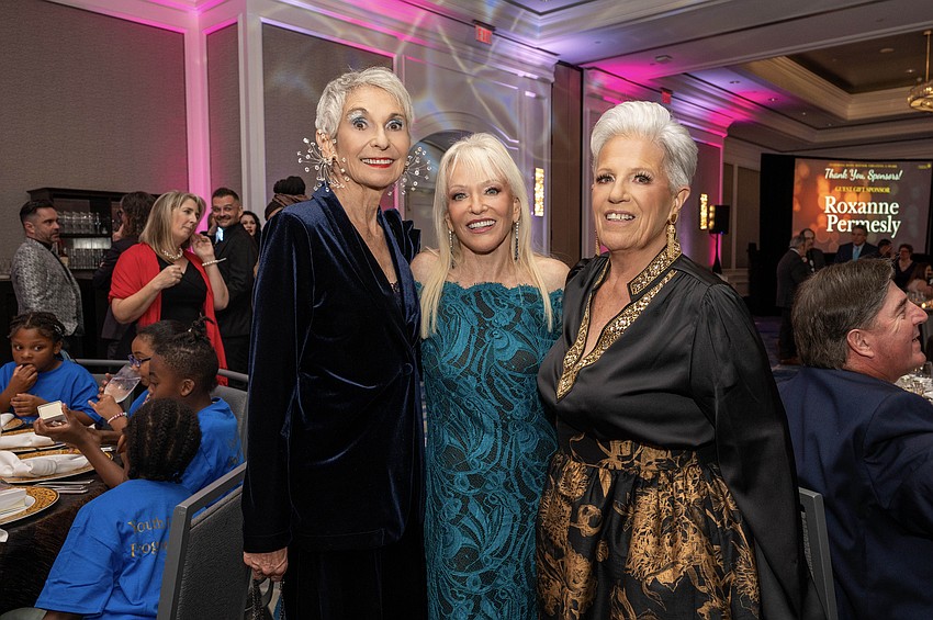 Roanne Permesly, Elisabeth Waters and Sunshine from Darkness Executive Director Maureen Hauck