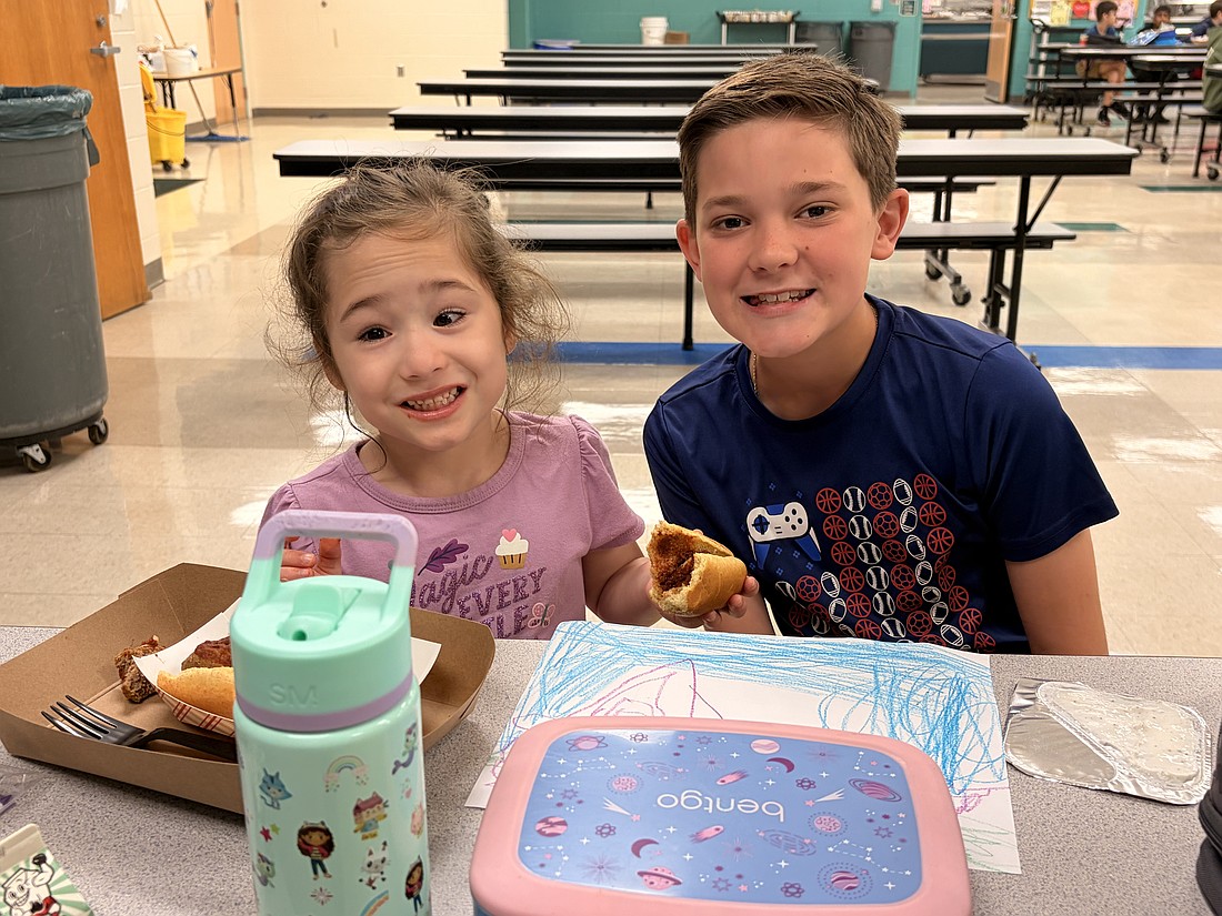 Gabrielle “Gigi” Almeida and Eli Taccetta were all smiles during lunch time. Jackie Keller said Gigi loves participating in Barracuda Buddies.