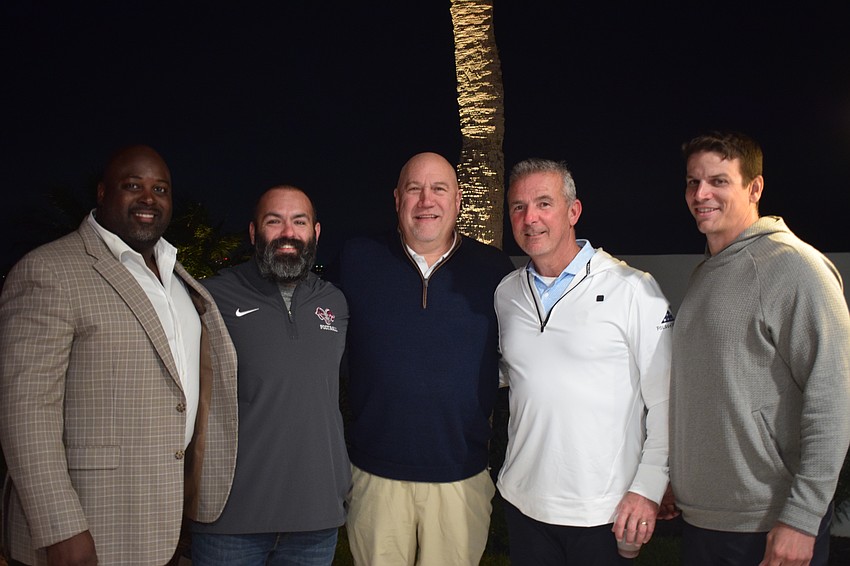 Urban Meyer is joining forces with local high school football coaches to offer mentorship. From left: Booker's Carlos Woods, Riverview's Mark Cristiani, IMG Academy's Greg Studrawa, Meyer and Cardinal Mooney's Jared Clark (Sarasota's Amp Campbell not pictured).