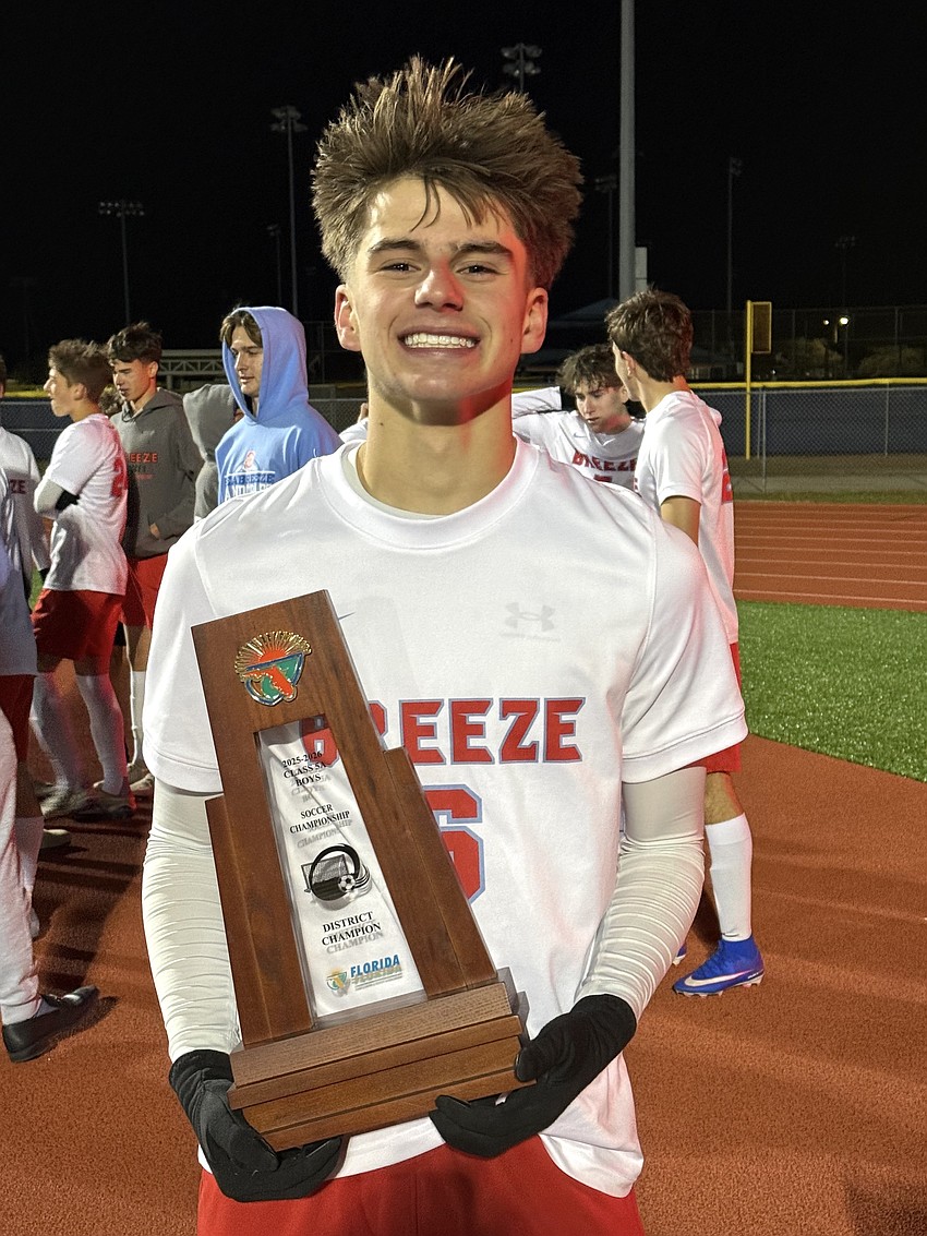 Seabreeze senior captain Luke Harrell holds the District 6-5A boys soccer championship trophy. Courtesy photo by Elaini Harrell Seabreeze senior captain Luke Harrell holds the District 6-5A boys soccer championship trophy. Courtesy photo by Elaini Harrell