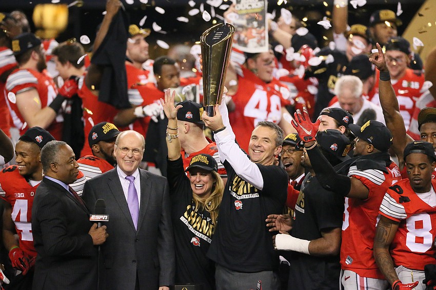 Urban Meyer guided Ohio State to the 2014 CFP National Championship over Oregon, marking the third title of his 17-year college coaching career.