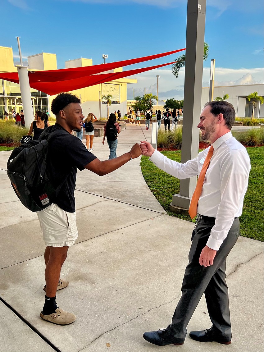Ryan Chase greets senior Daniel Sanchez on the first day of school in 2026.