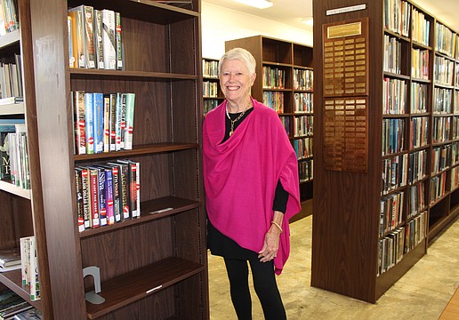 Mary Baker, board president of the Longboat Library, says guests can plan a fun book date for Valentine's Day to shop the annual sale.