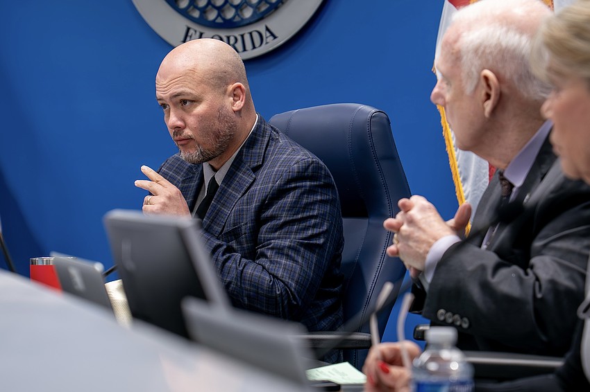 Commissioner Jason Bearden expresses concern over what kind of impacts the hiring freeze will have on the service provided to residents.