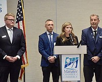 Manatee County administrators Corey Stutte, Bryan Parnell, Courtney De Pol and Charlie Bishop speak at a Manatee Chamber of Commerce meeting in December. On Jan. 28, all four spoke to commissioners about a temporary hiring freeze.