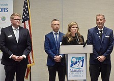 Manatee County administrators Corey Stutte, Bryan Parnell, Courtney De Pol and Charlie Bishop speak at a Manatee Chamber of Commerce meeting in December. On Jan. 28, all four spoke to commissioners about a temporary hiring freeze.