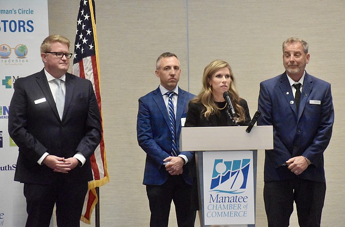 Manatee County administrators Corey Stutte, Bryan Parnell, Courtney De Pol and Charlie Bishop speak at a Manatee Chamber of Commerce meeting in December. On Jan. 28, all four spoke to commissioners about a temporary hiring freeze.