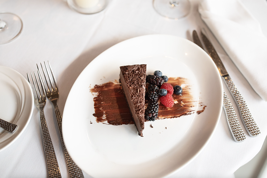 Gluten-Free Vegan Chocolate Cheesecake at Michael's on East steals the spotlight. Gluten-Free Vegan Chocolate Cheesecake at Michael's on East steals the spotlight.