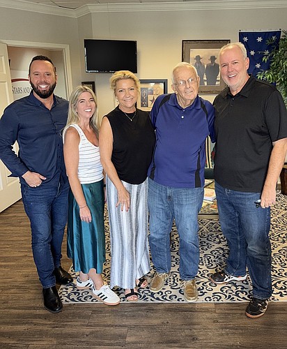 Austin Arthur, Beth Wincey, Kathee Pierce from West Orange Scholarship Foundation smiled with Fred Crabtree and Andy Crabtree from the Jimmy Crabtree Cancer Fund.